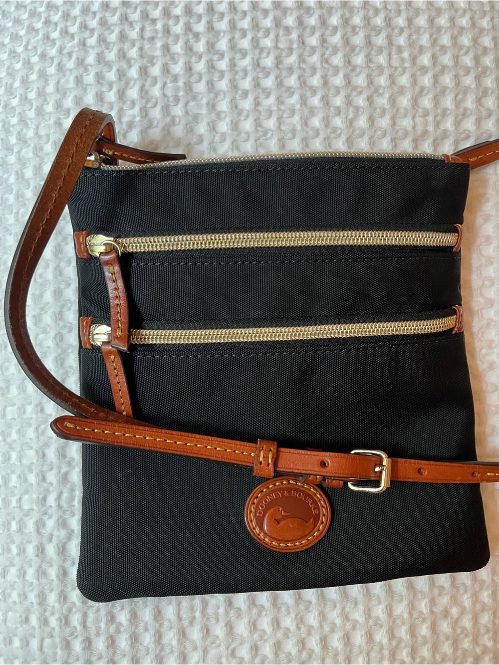 Dooney & Bourke Black Crossbody with Brown Leather Trim and Gold Triple Zippers